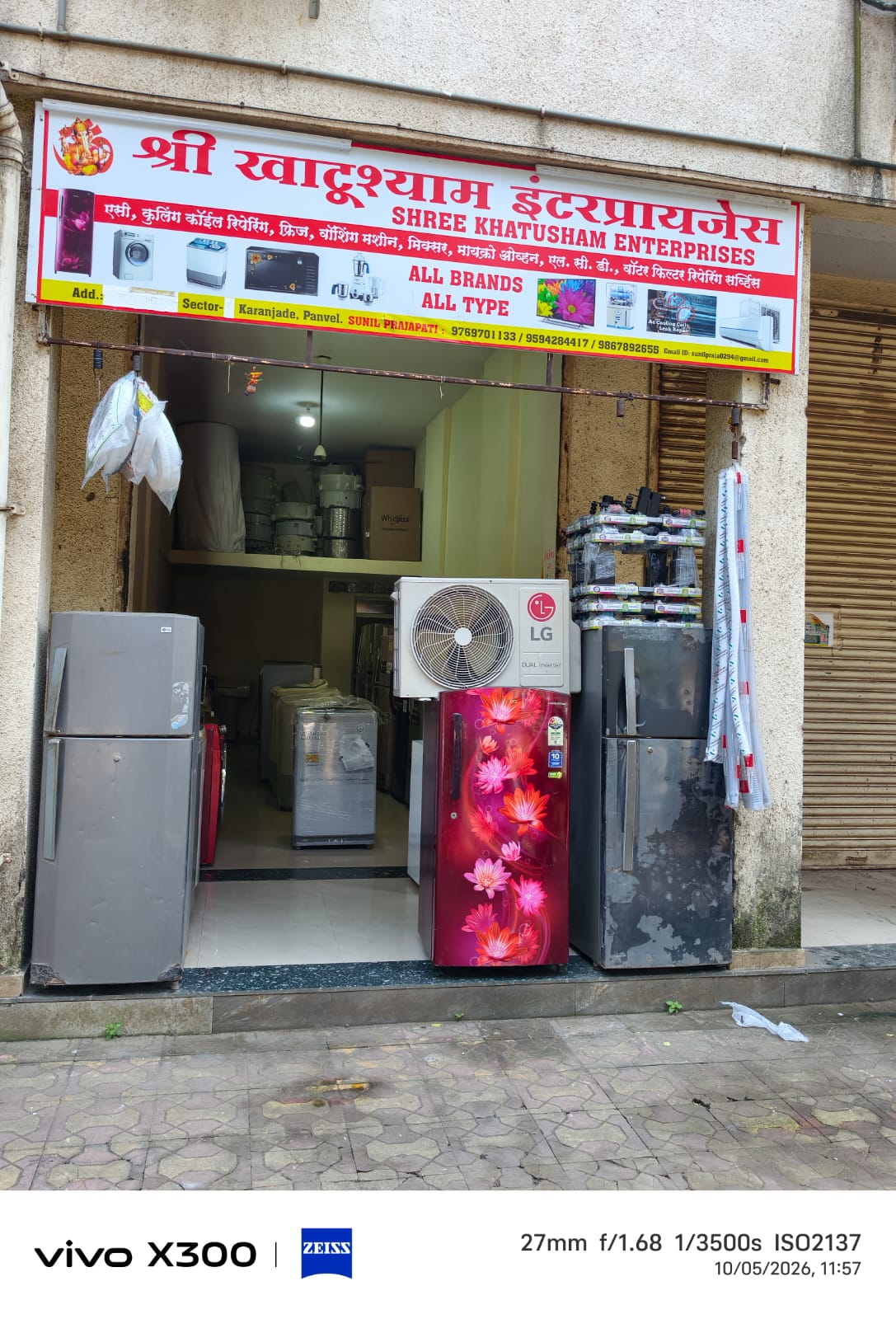 Shop signboard showing All Brands All Type appliance repair services